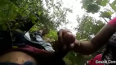 Guy simply lies on back but sex partner gives him a blowjob outdoors