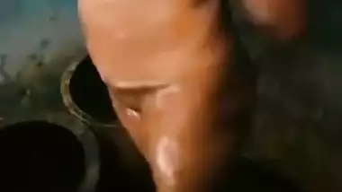 Indian MILF with a little big saggy but still hot tits washes in solo porn