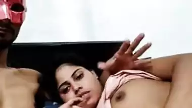 Fat Indian XXX bitch gets her pussy fingered by her masked lover MMS