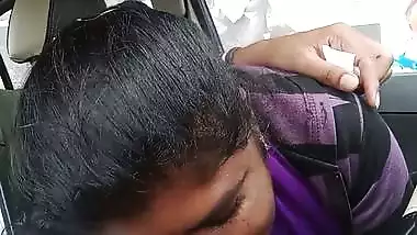 Telugu woman gives a desi blowjob to her man in a car
