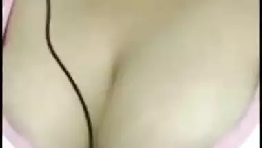 Sexy Desi mom exposes boobies to jerking off man on the other side