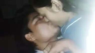 Sleeping Desi babe tries to cover face while sex partner kisses XXX lips