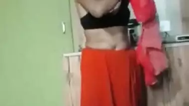 XXX video of naked Desi wife who puts clothes on item by item on cam