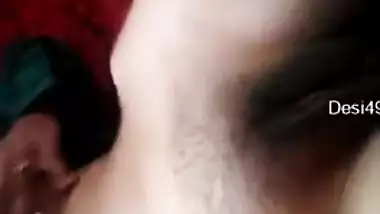 Dissolute Desi camgirl lifts green dress to brag about XXX parts
