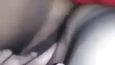 Horny Desi gal displays saggy tits and also fingers her XXX cunny