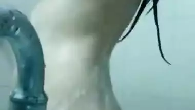 Indian girl always takes a camera when she goes to take a shower
