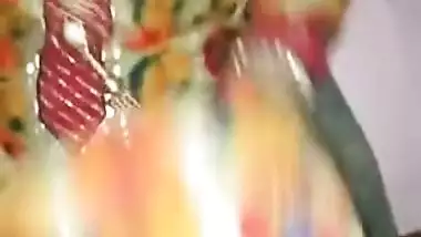 Shy Desi teeny hikes up dress to show her XXX pussy in the bathroom