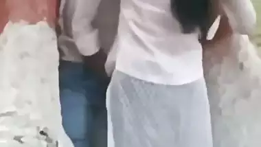 College couple enjoys outdoor sex below a big tree