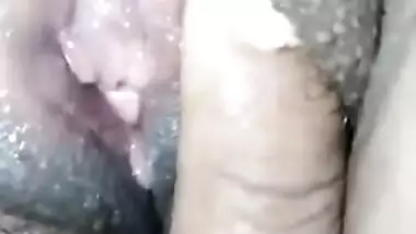 Man touches XXX pussy and spreads labia of Desi babe in close-up