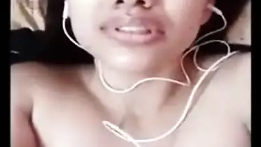 Desi female masturbates XXX pussy in bed for lover via video link