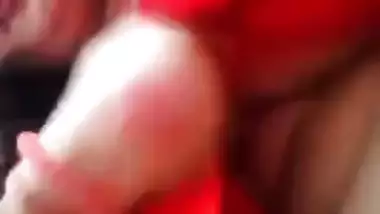 Plump amateur Desi wife in a red sari performs hot XXX striptease