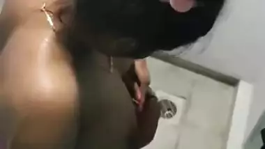 Libidinous Desi wife shows how she puts her pink bra on XXX titties