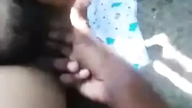 Outdoor XXX video of Lankan dude fingering his Desi GF's hairy cunt