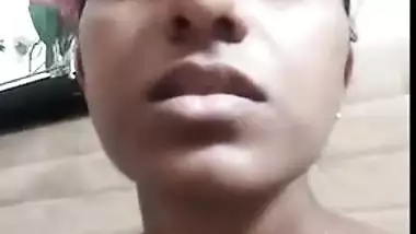 Nude Indian XXX girl smoking and showing her tits and cunt on selfie cam
