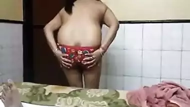 Indian female exposes her sex rear on XXX lover's camera in the bedroom