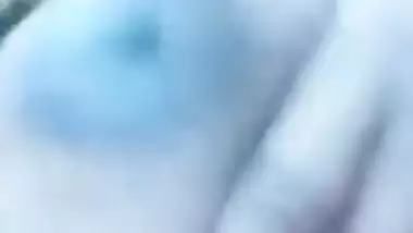 Slut exposes natural tits with dark nipples for XXX online Desi lover