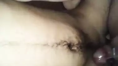 Flaunting shaved XXX twat in bed ends for Indian babe with fingering