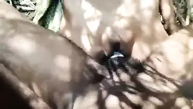 Indian young Desi girl took to the forest pressed her boobs and fucked her