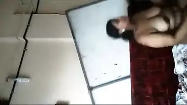 Indian sex movie scene of a older pair enjoying a home sex session